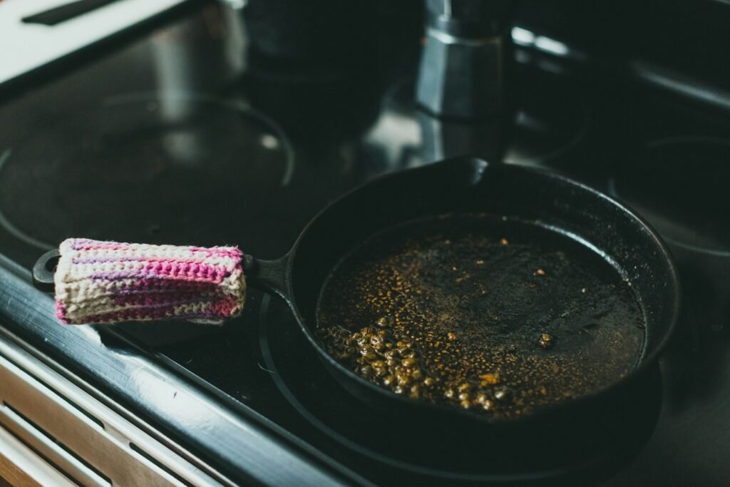 A black cast iron frying pan on a stove